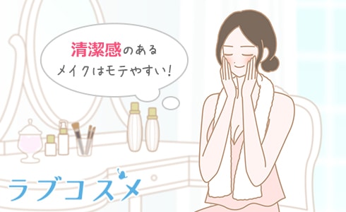 女性の頬に触れる男性